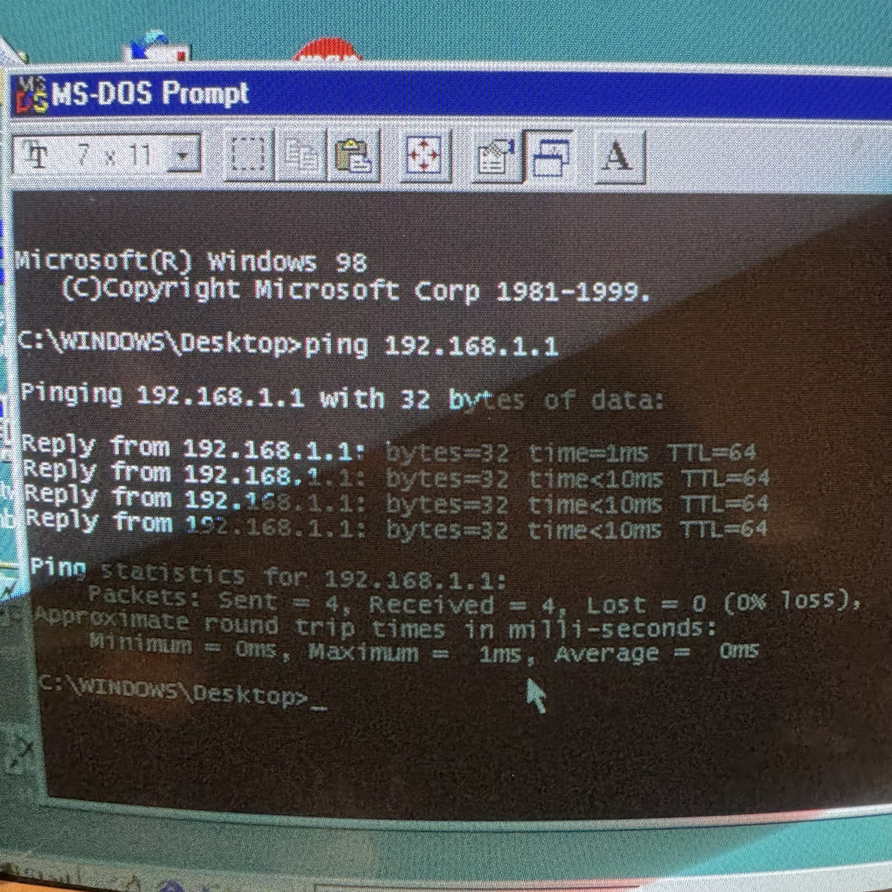 Windows 98 command prompt showing successful ping